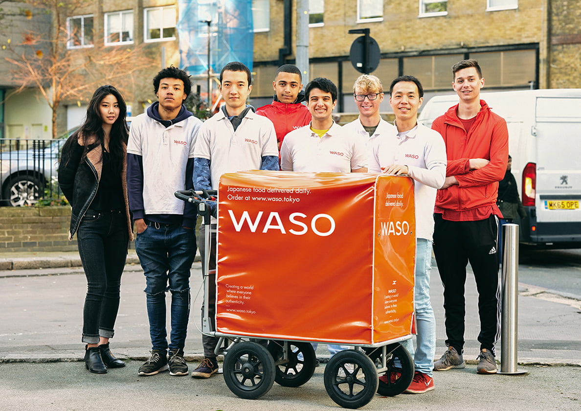 Photograph of eight team members who worked with WASO