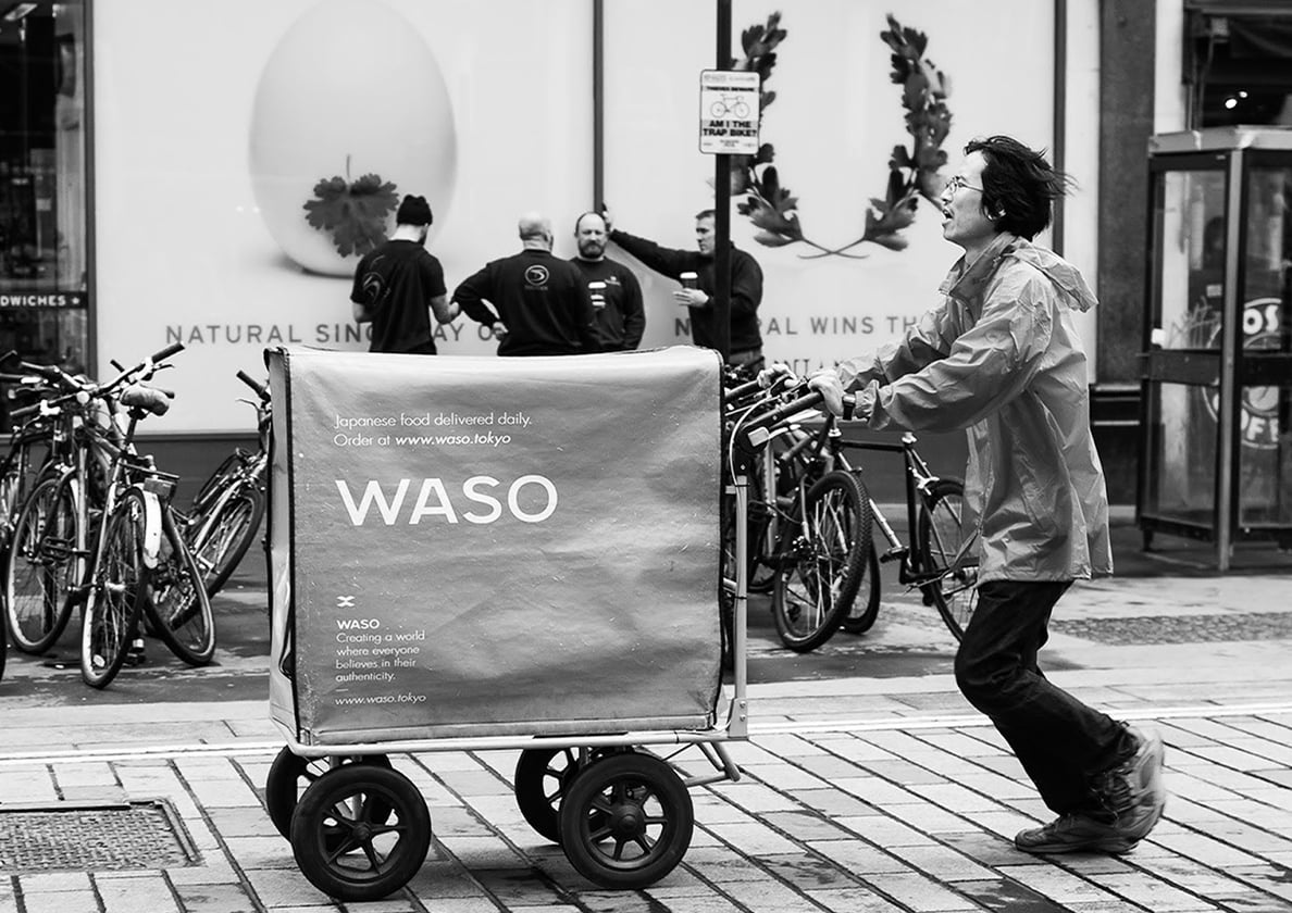 Photograph running alongside a WASO trolley
