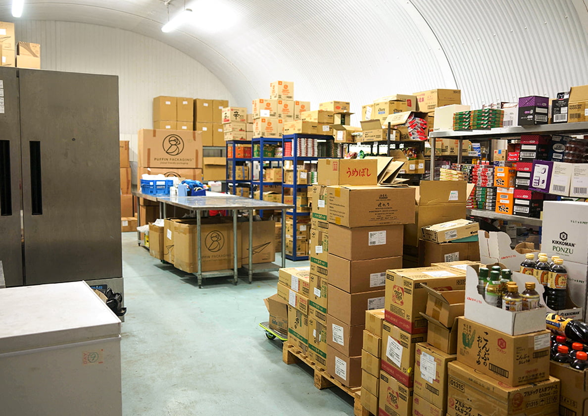 Photograph of the WASO warehouse with an extensive product lineup